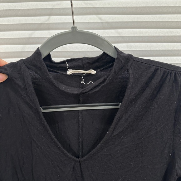 Black long sleeve blouse with cutout. - Picture 3 of 4